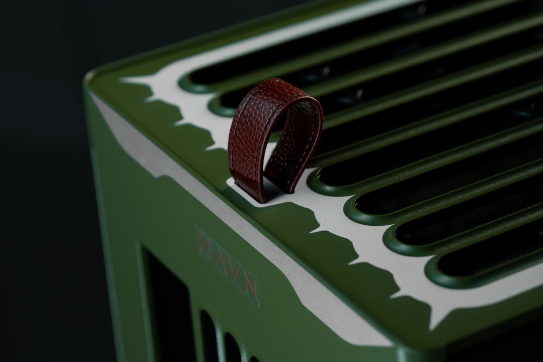 close-up-of-a-green-object-with-a-brown-strap-xtbi2-f0kv8